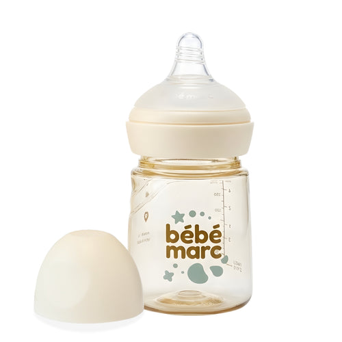 Baby bottle with cap on a white background, featuring the brand 'bébémarc'.