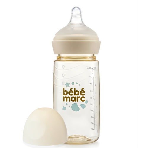 Baby bottle with beige cap and base on a white background, featuring 'bébémarc' branding.